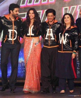 Deepika Padukone in Orange Saree and Black Jacket with Happy New Year Team